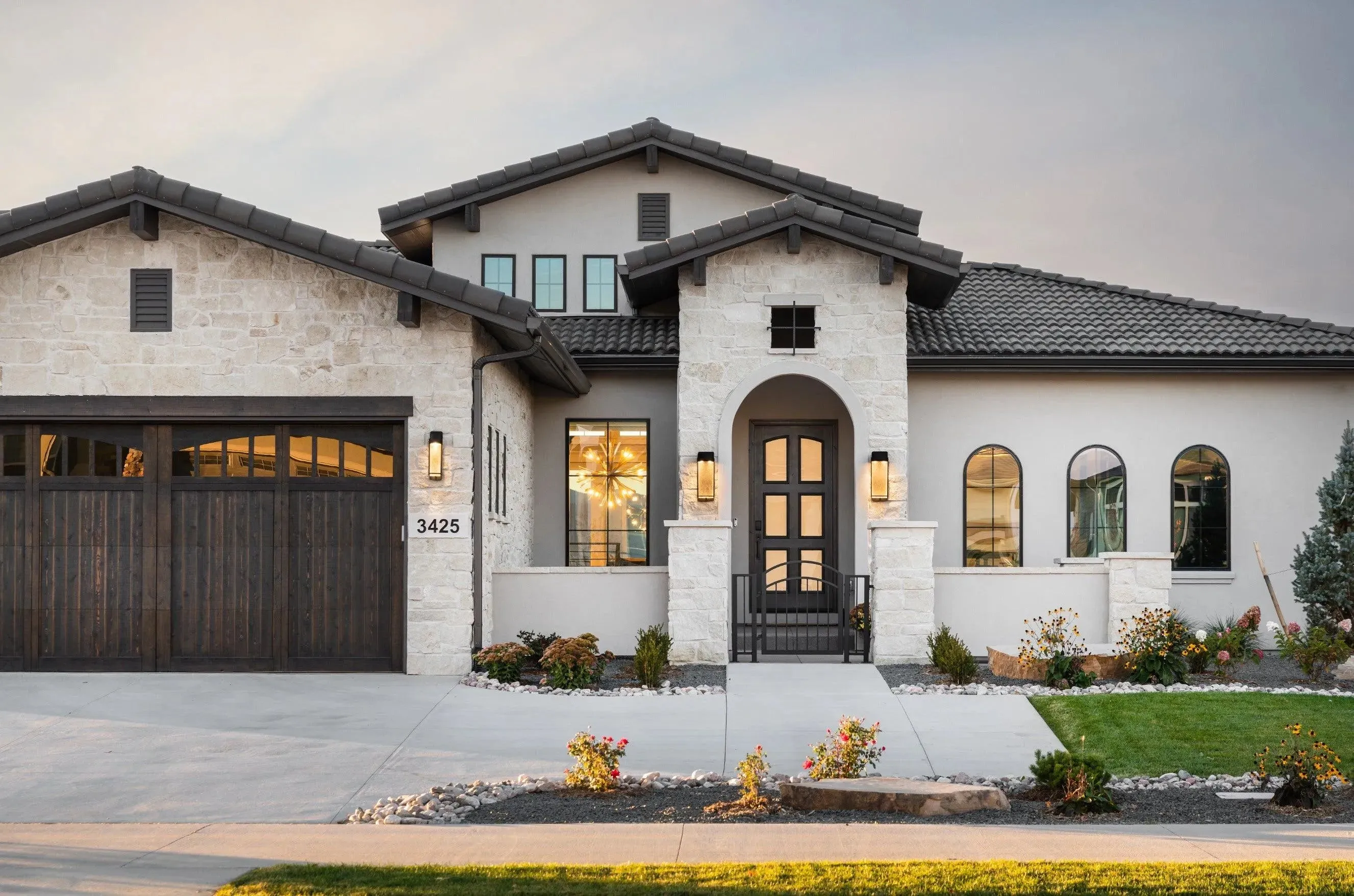 Luxury One-Story Home with Walkout Basement, Grand Room, and Expansive Deck
